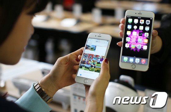 iPhone6“襲”韓 運營商攜手“果粉”熱情迎接（組圖）